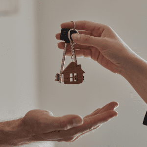 A man buying houses for sale and getting the keys