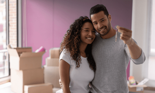 young family celebrating their new house